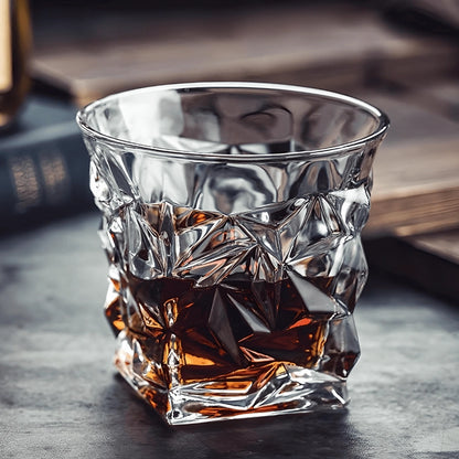 Japanese crystal whisky glass filled with dark-colored whiskey – premium clear whisky tumbler